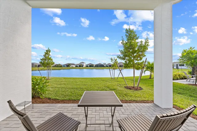 a view of a lake with a big yard