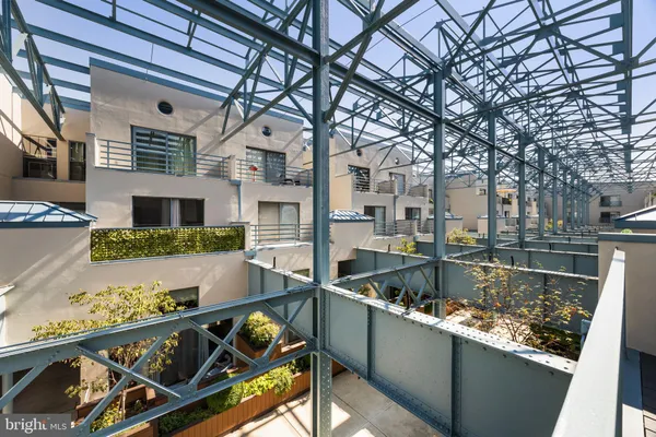a view of swimming pool with outdoor seating