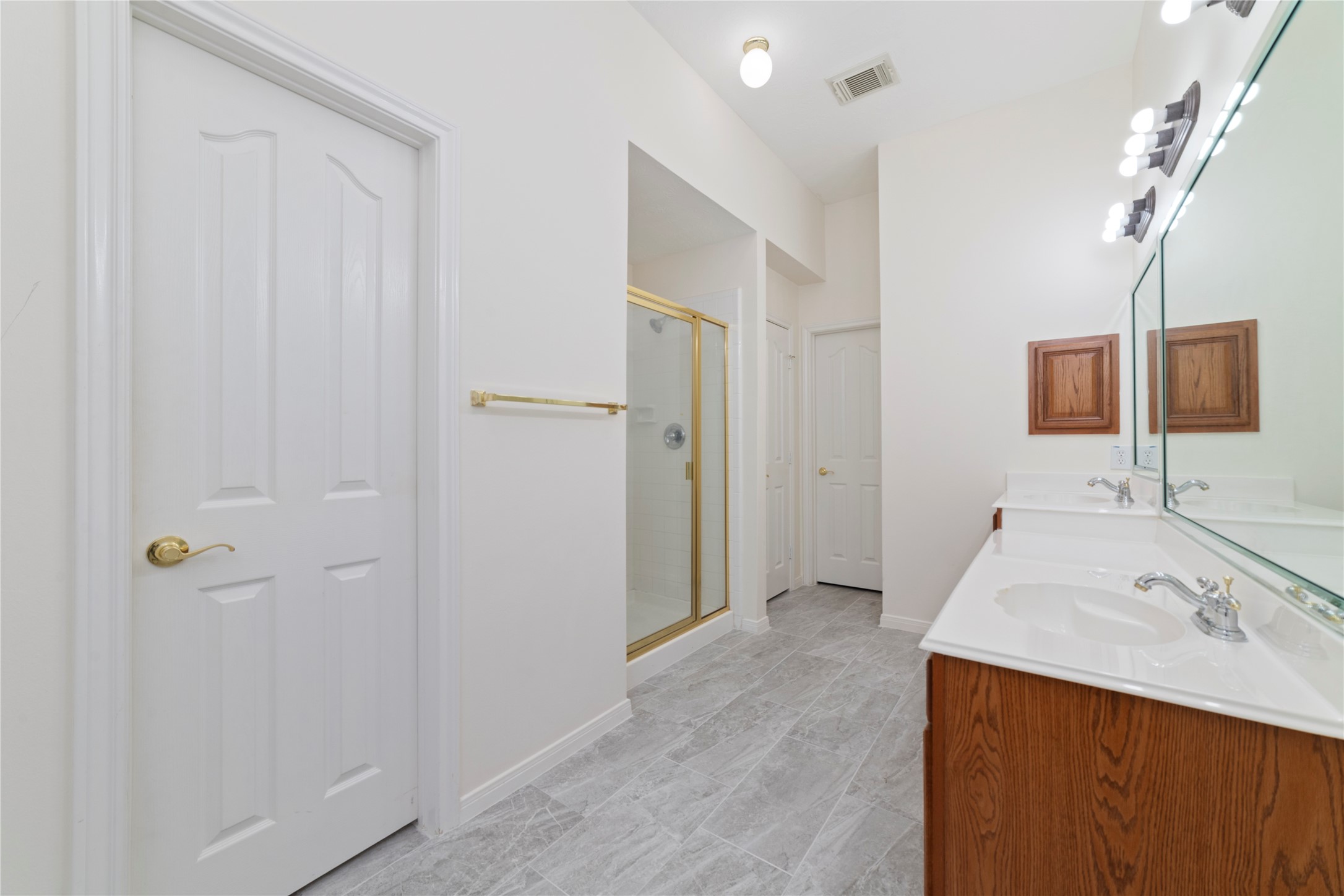 11108 Dawson Road Pearland, TX 77584 - Photo 15 of 43 a bathroom with a sink and a mirror