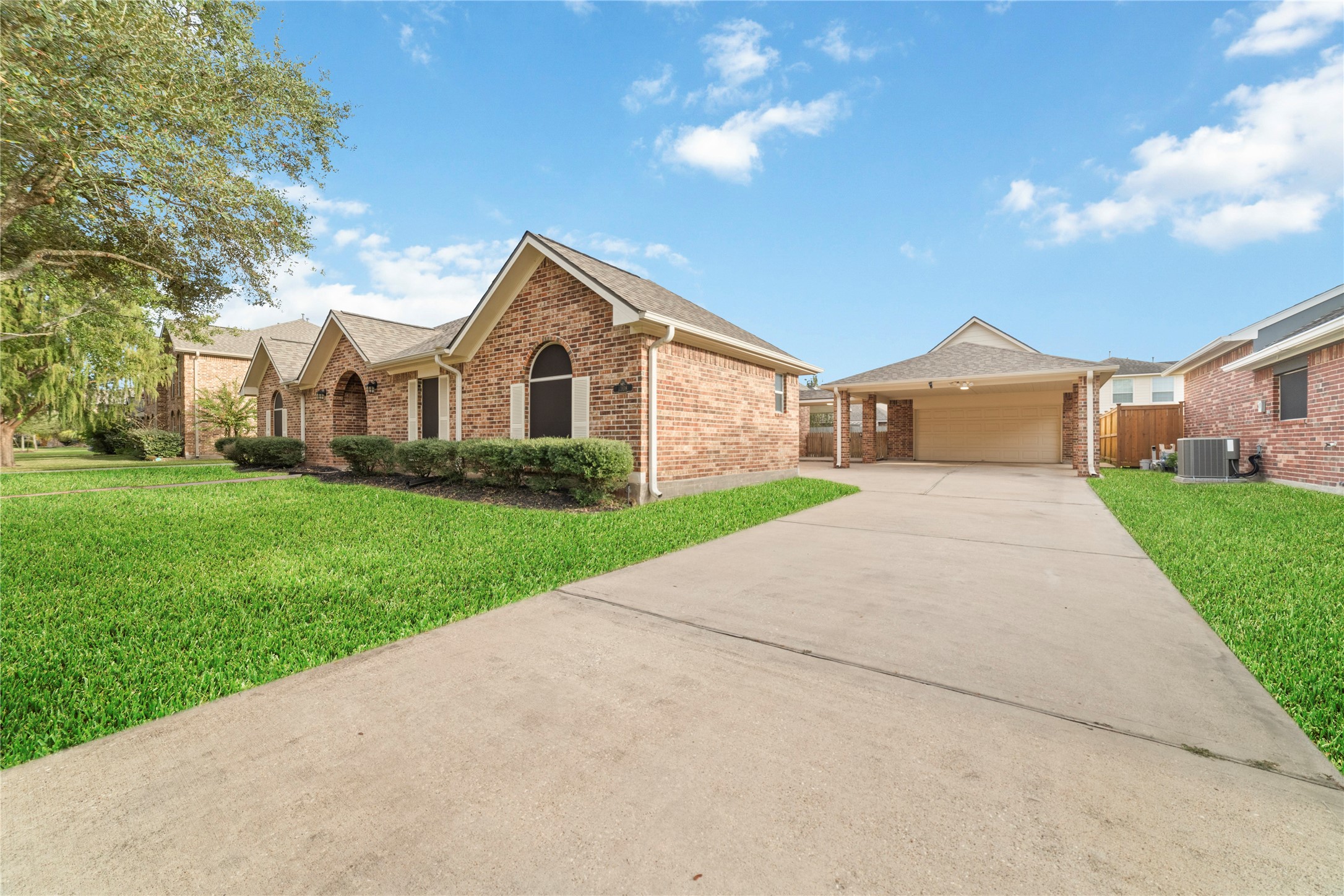 11108 Dawson Road Pearland, TX 77584 - Photo 2 of 43 a front view of house with yard and green space