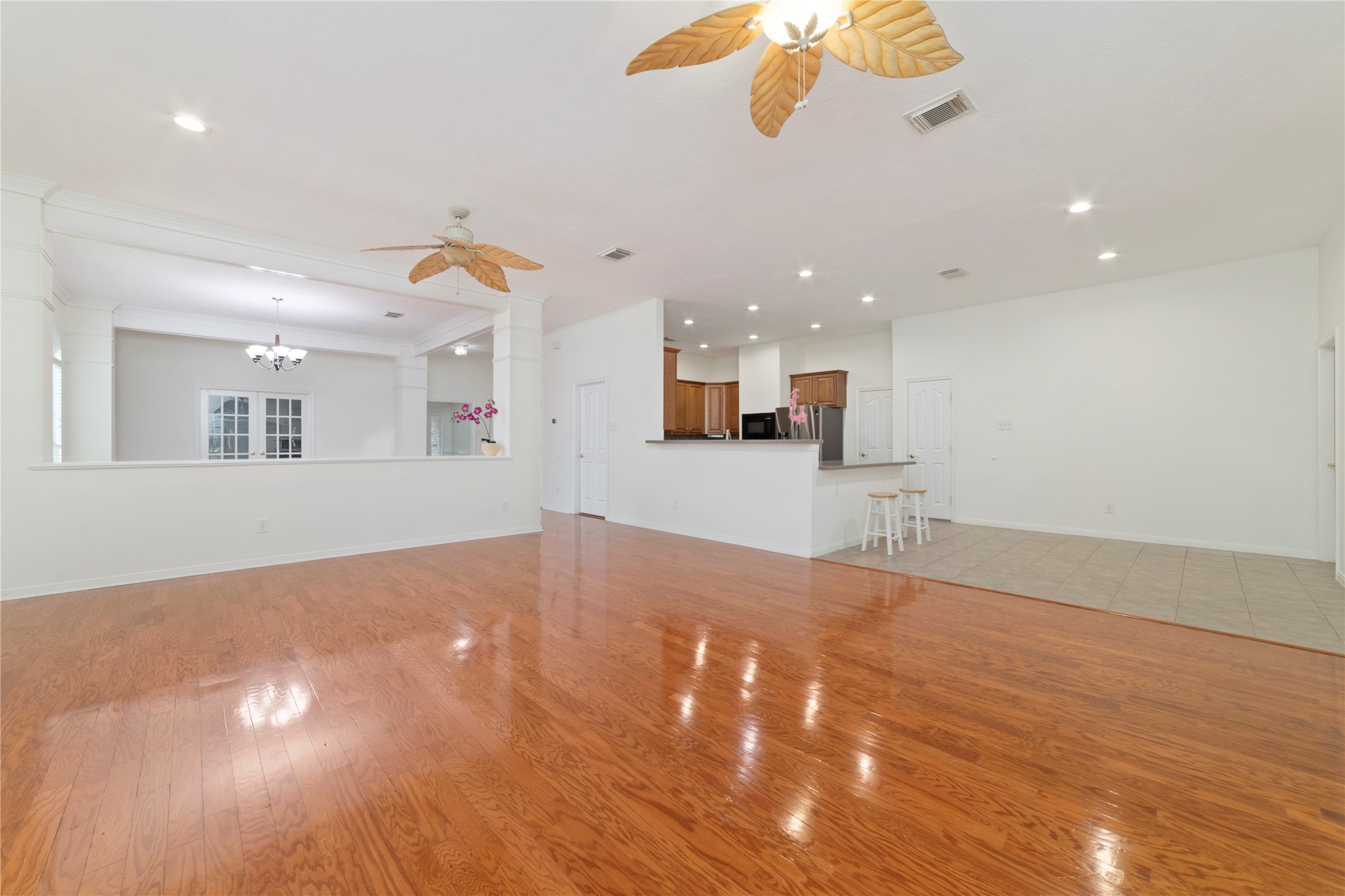 11108 Dawson Road Pearland, TX 77584 - Photo 26 of 43 a view of a kitchen with a sink and a chandelier