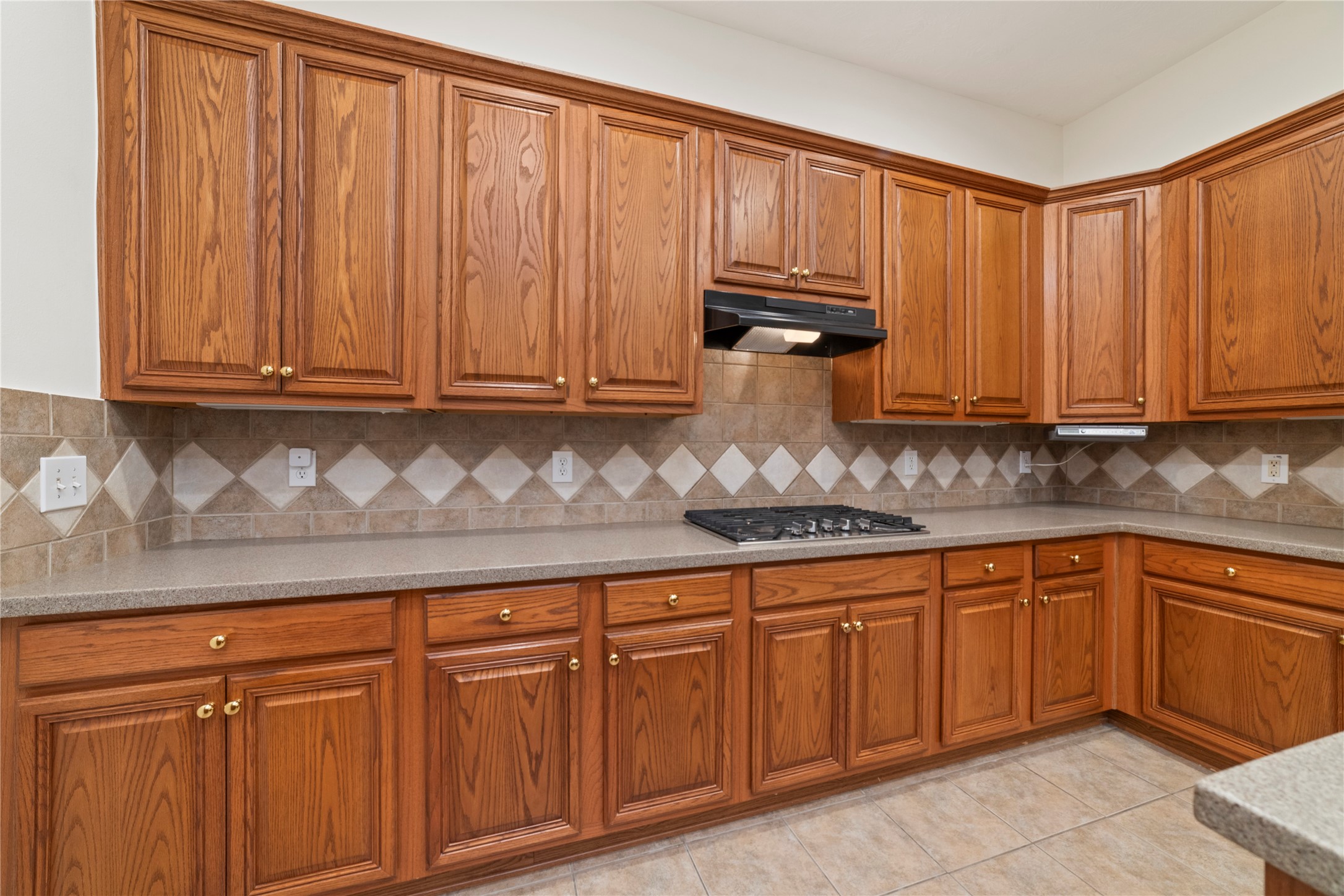 11108 Dawson Road Pearland, TX 77584 - Photo 31 of 43 a kitchen with stainless steel appliances granite countertop a sink dishwasher and cabinets with wooden cabinets