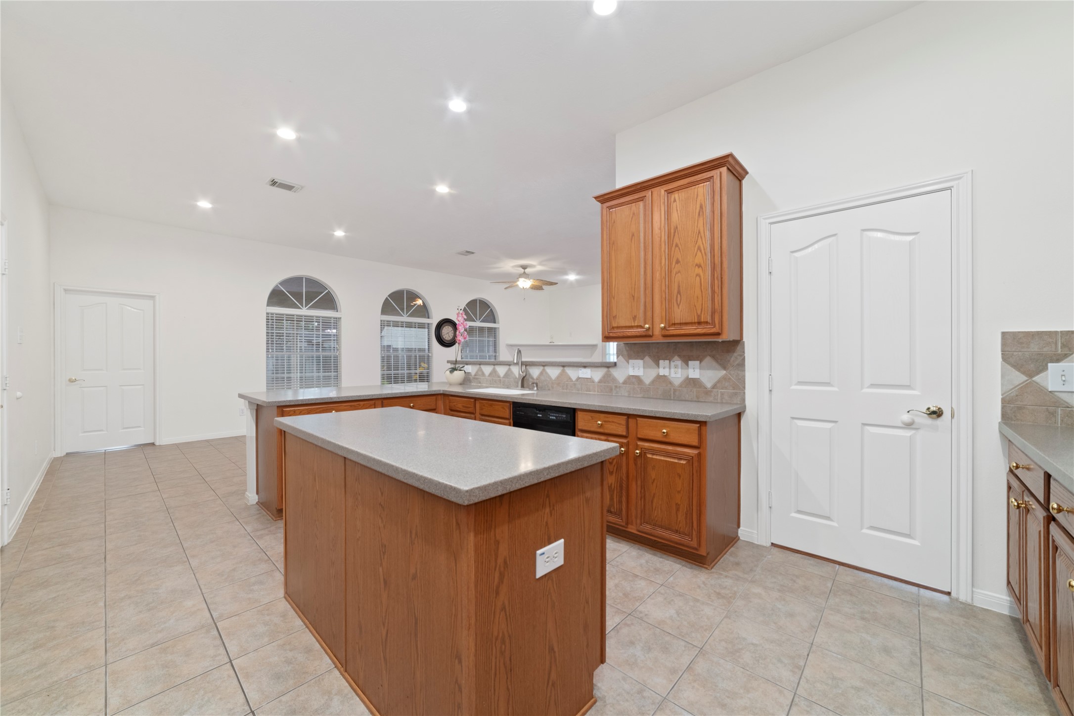 11108 Dawson Road Pearland, TX 77584 - Photo 33 of 43 a kitchen with stainless steel appliances granite countertop a sink and dishwasher