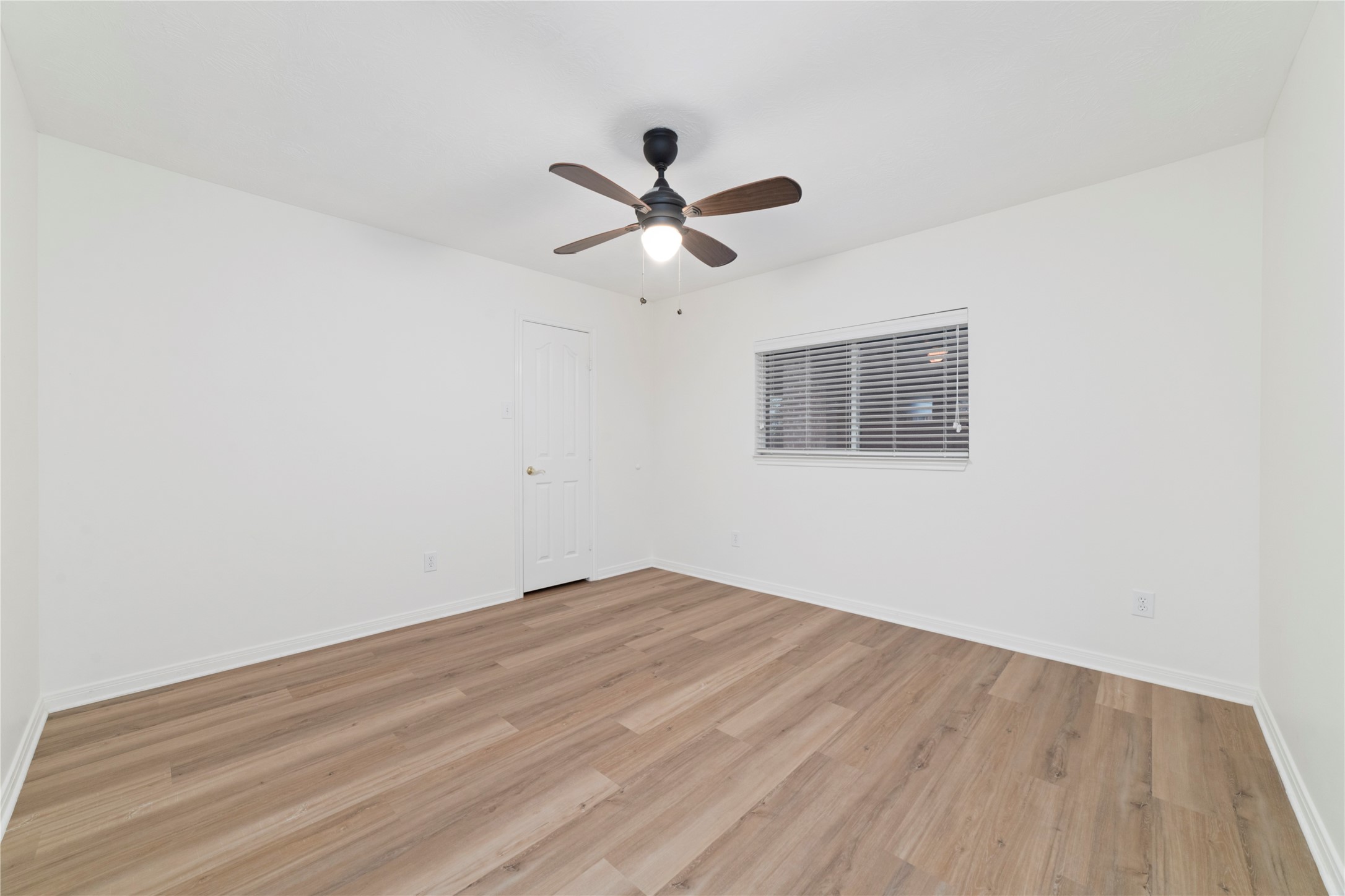 11108 Dawson Road Pearland, TX 77584 - Photo 35 of 43 a view of empty room with wooden floor