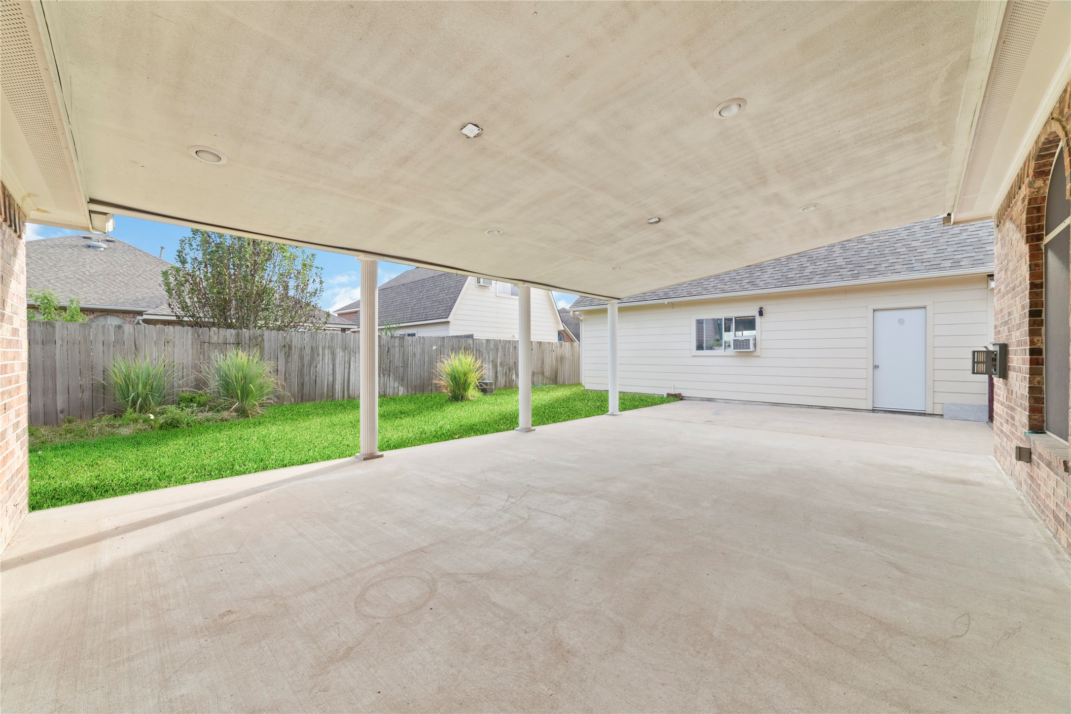 11108 Dawson Road Pearland, TX 77584 - Photo 8 of 43 a view of a house with a yard and garage