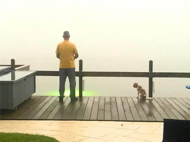 a view of a terrace with furniture