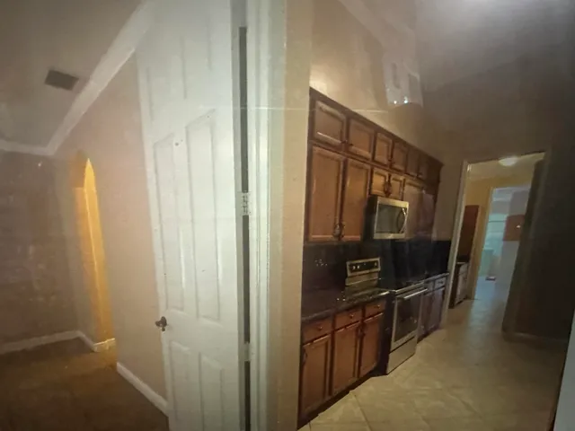 a bathroom with a sink a mirror and a shower