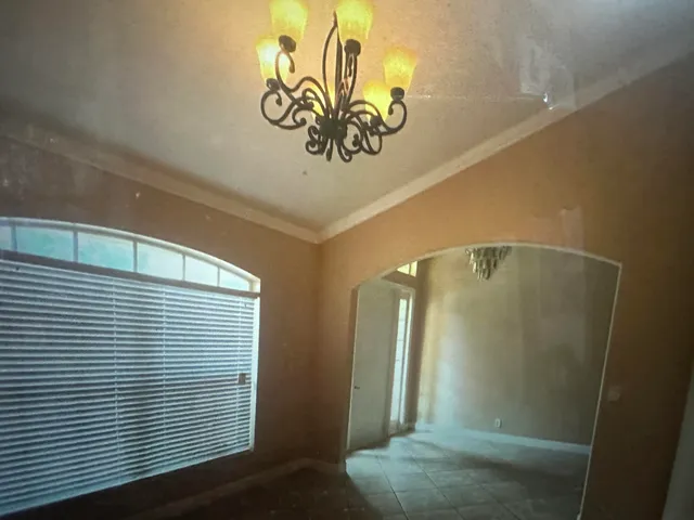 a room with furniture and a window