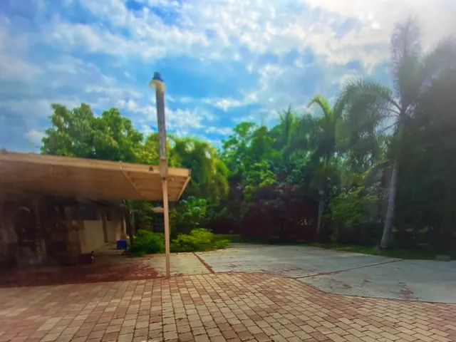 a view of a hallway with a yellow space