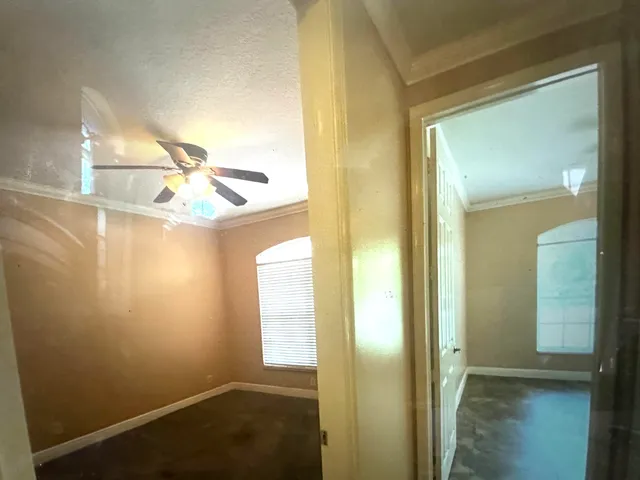 a kitchen with a refrigerator and a microwave