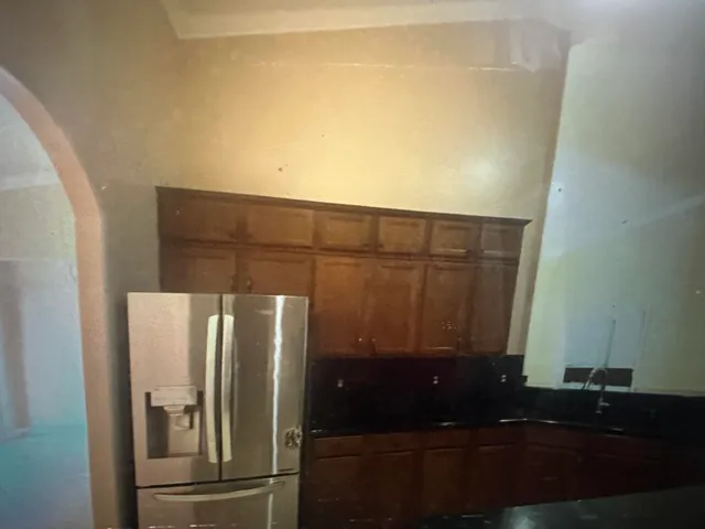 a bench sitting in middle of a yard