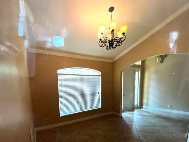 a view of a room with a window