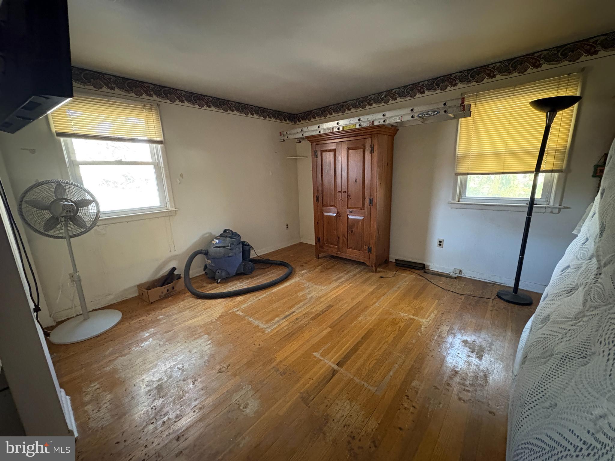 2204 New Albany Road Cinnaminson, NJ 08077 - Photo 13 of 22 a view of a livingroom with wooden floor and window