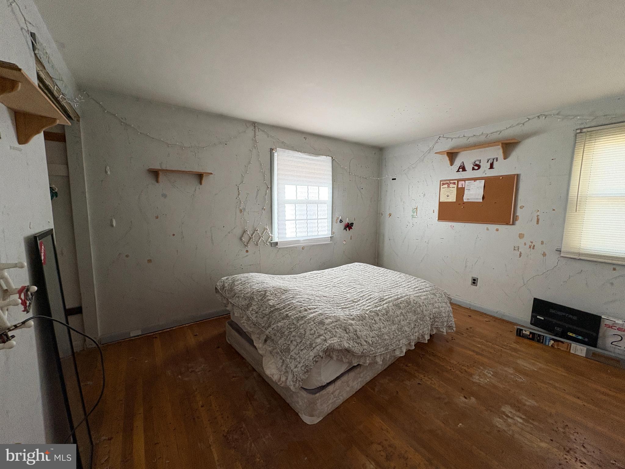 2204 New Albany Road Cinnaminson, NJ 08077 - Photo 15 of 22 a bedroom with a bed and a window