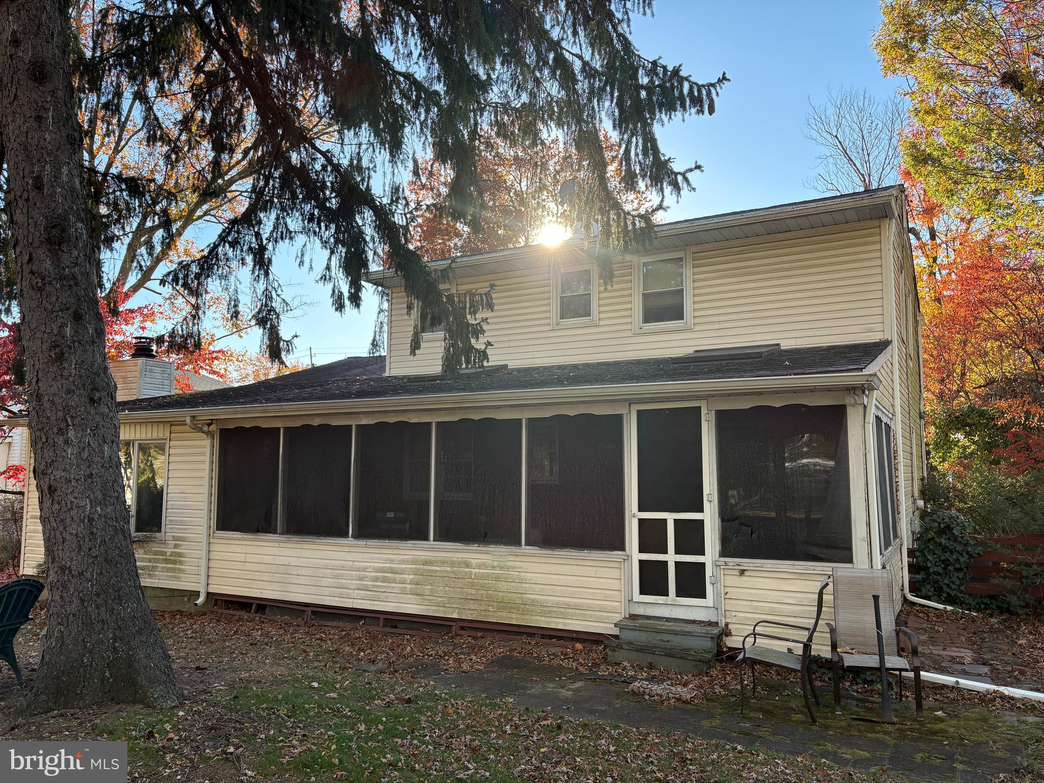 2204 New Albany Road Cinnaminson, NJ 08077 - Photo 19 of 22 a view of a house with a large window and a large tree