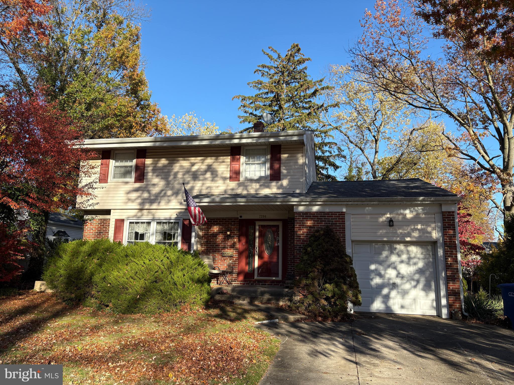 2204 New Albany Road Cinnaminson, NJ 08077 - Photo 2 of 22 a front view of a house with garden