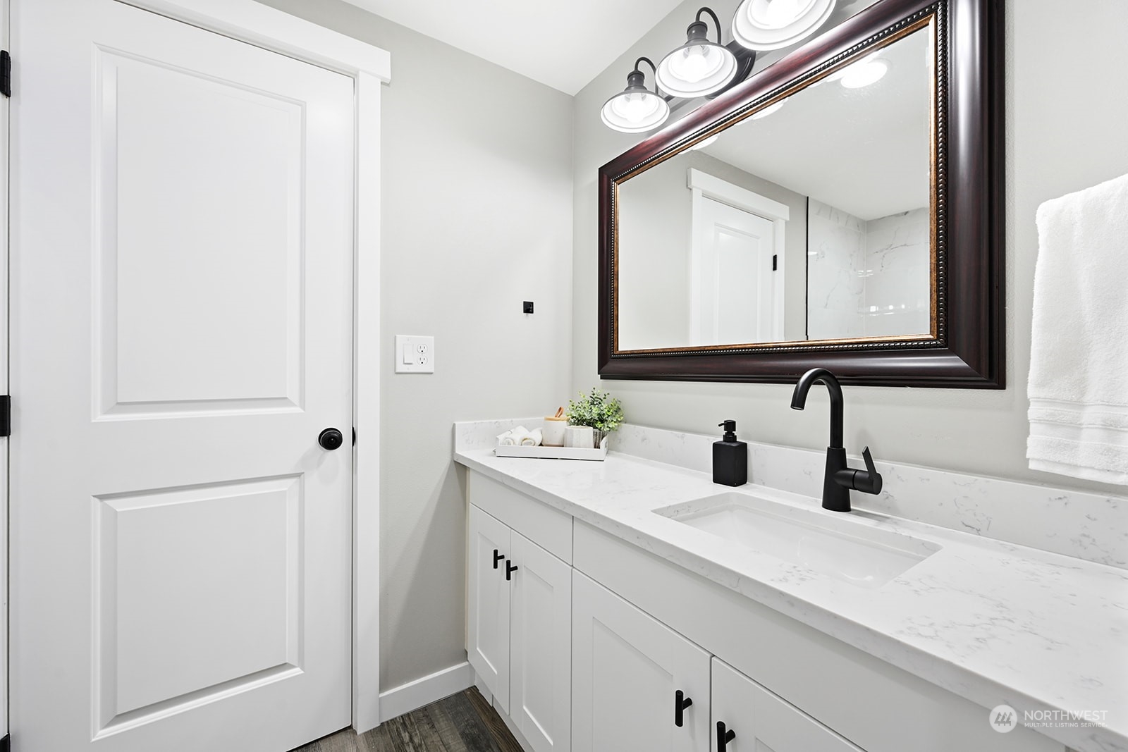 10841 Highway 12 Rochester, WA 98579 - Photo 17 of 23 a bathroom with a sink and a mirror