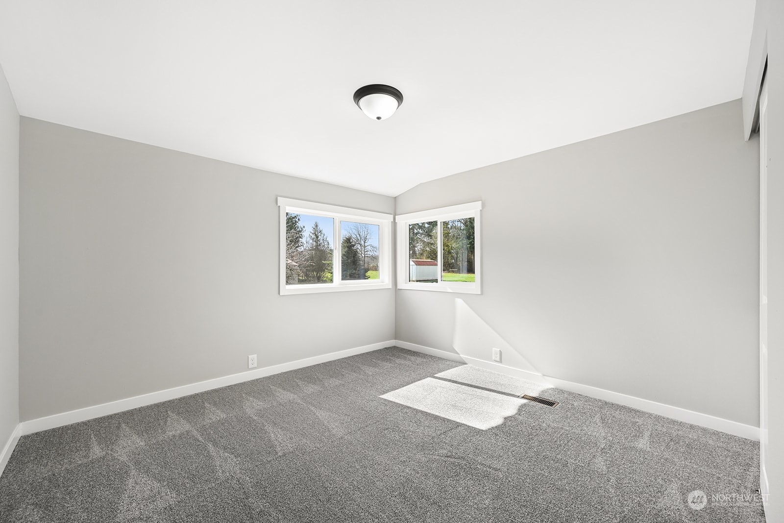 10841 Highway 12 Rochester, WA 98579 - Photo 18 of 23 an empty room with windows