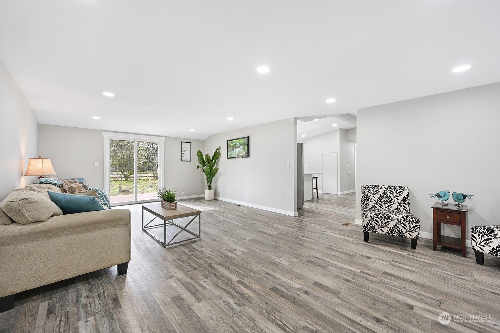 10841 Highway 12 Rochester, WA 98579 - Photo 2 of 23 a living room with furniture and wooden floor