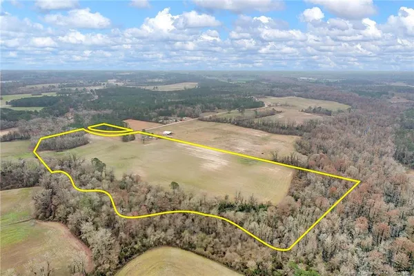 a view of swimming pool with seating