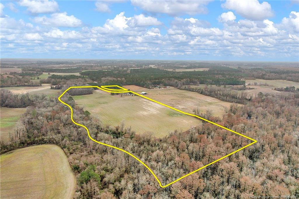 Pittman Loop Road Fairmont, NC 28340 - Photo 6 of 14 a view of outdoor space and swimming pool