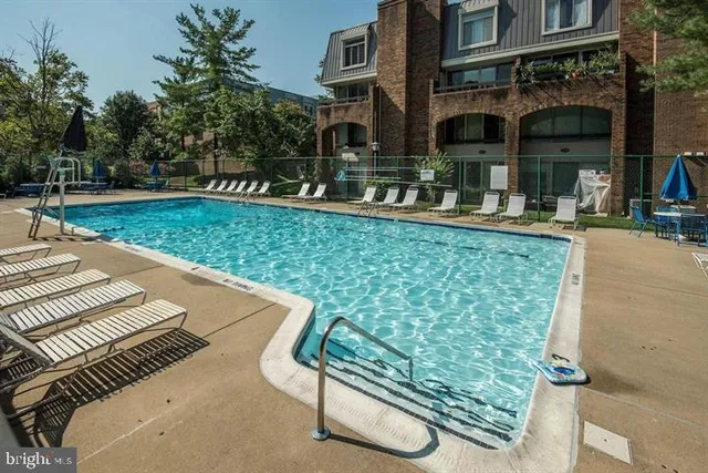 a view of a street with sitting area