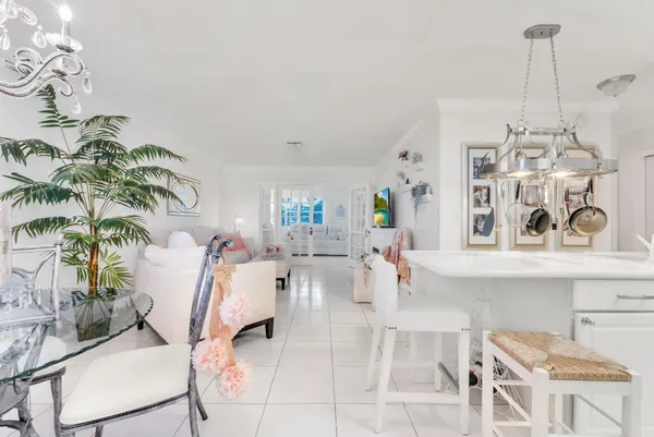 a view of living room with furniture and window