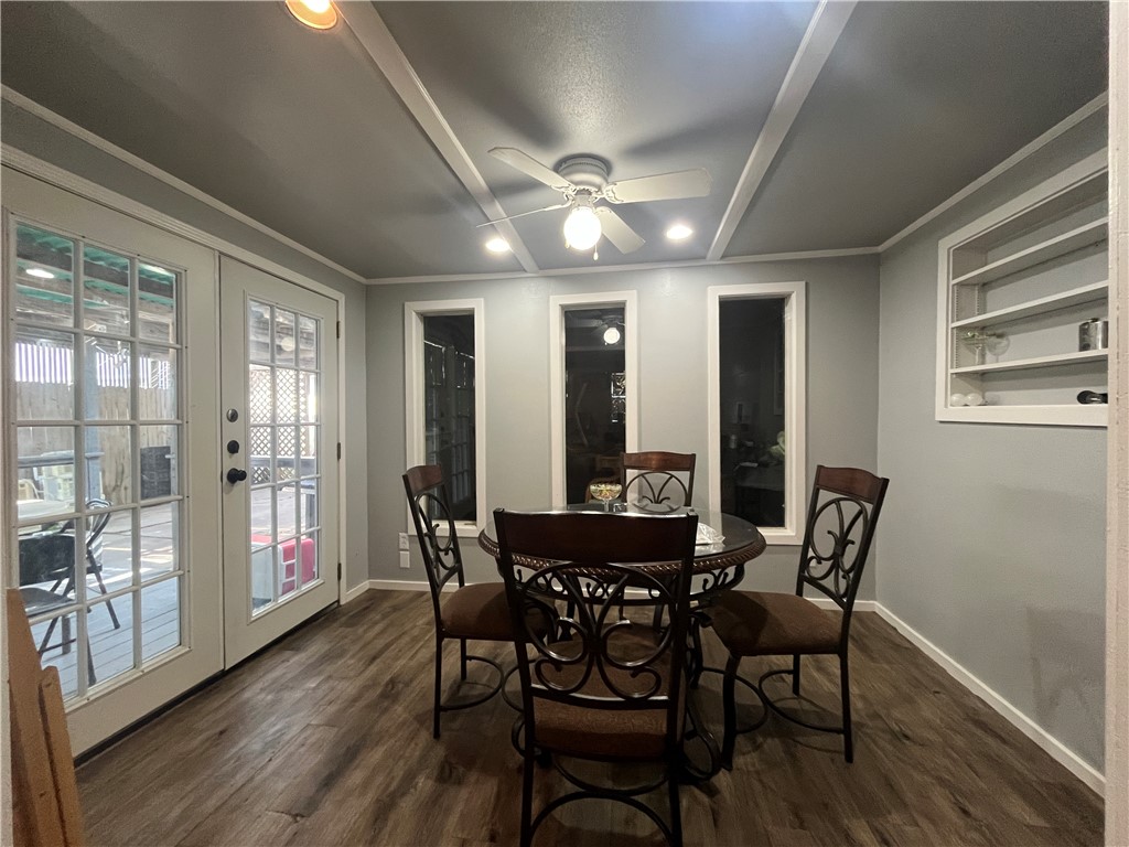 1453 14th Street Corpus Christi, TX 78404 - Photo 3 of 23 a view of a dining room with furniture window and wooden floor