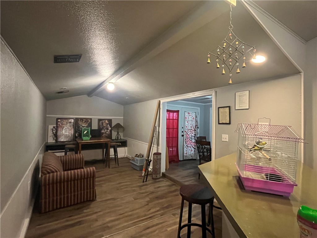 1453 14th Street Corpus Christi, TX 78404 - Photo 5 of 23 a living room with furniture and wooden floor