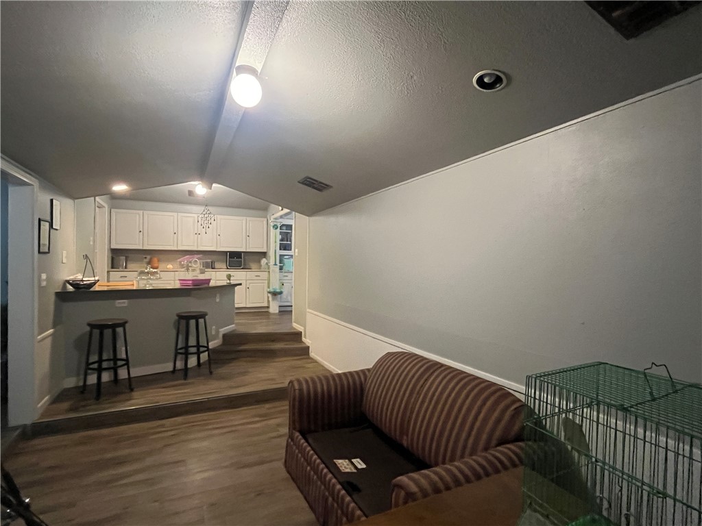 1453 14th Street Corpus Christi, TX 78404 - Photo 6 of 23 a living room with stainless steel appliances furniture and a chandelier