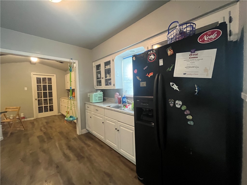 1453 14th Street Corpus Christi, TX 78404 - Photo 10 of 23 a spacious bathroom with a granite countertop sink and a refrigerator