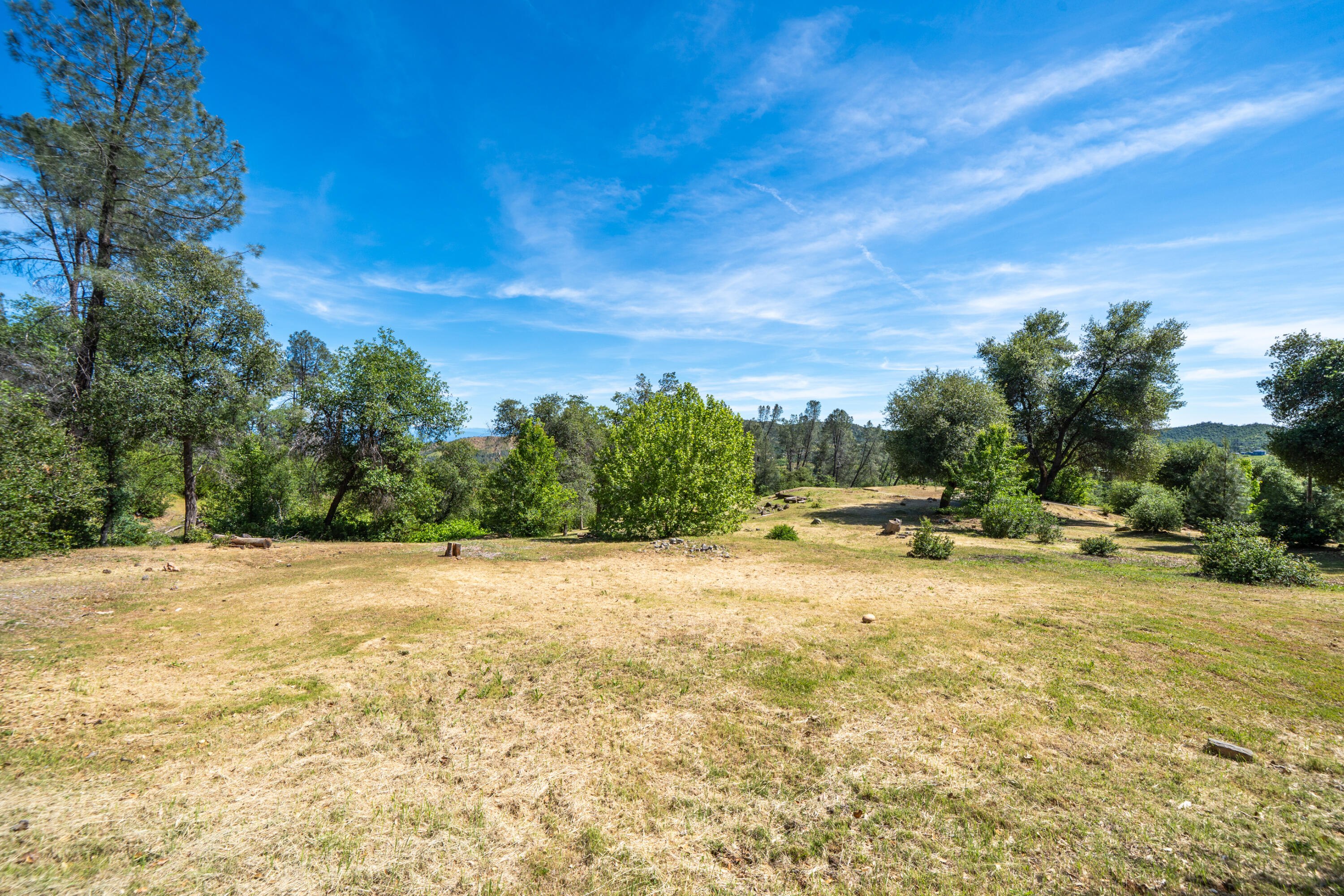 15809 Old Stage Coach Road Redding, CA 96001 - Photo 18 of 33 a view of back yard of the house