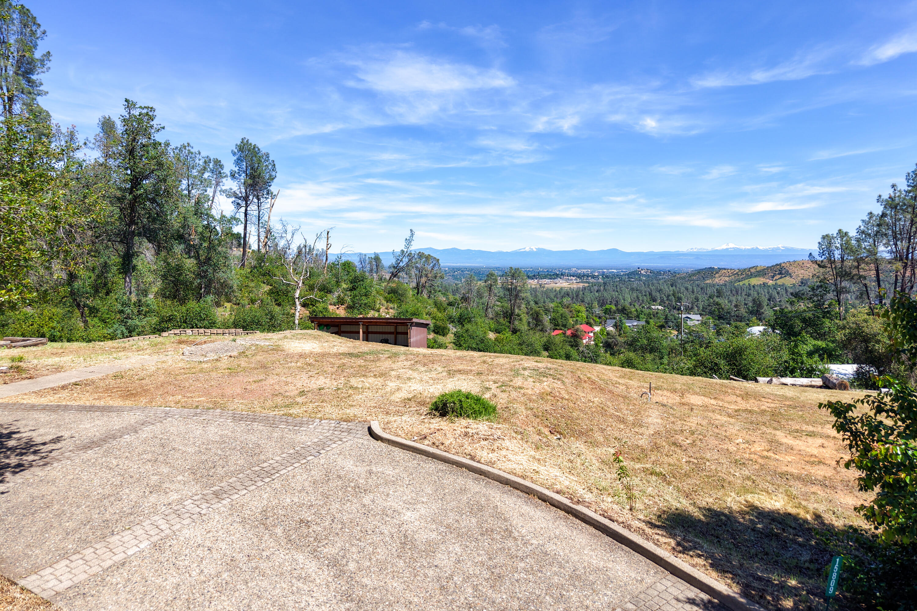 15809 Old Stage Coach Road Redding, CA 96001 - Photo 3 of 33 a view of a road with a yard