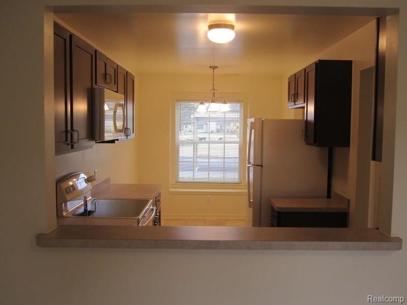 1310 Pine Ridge Drive Highland, MI 48357 - Photo 9 of 29