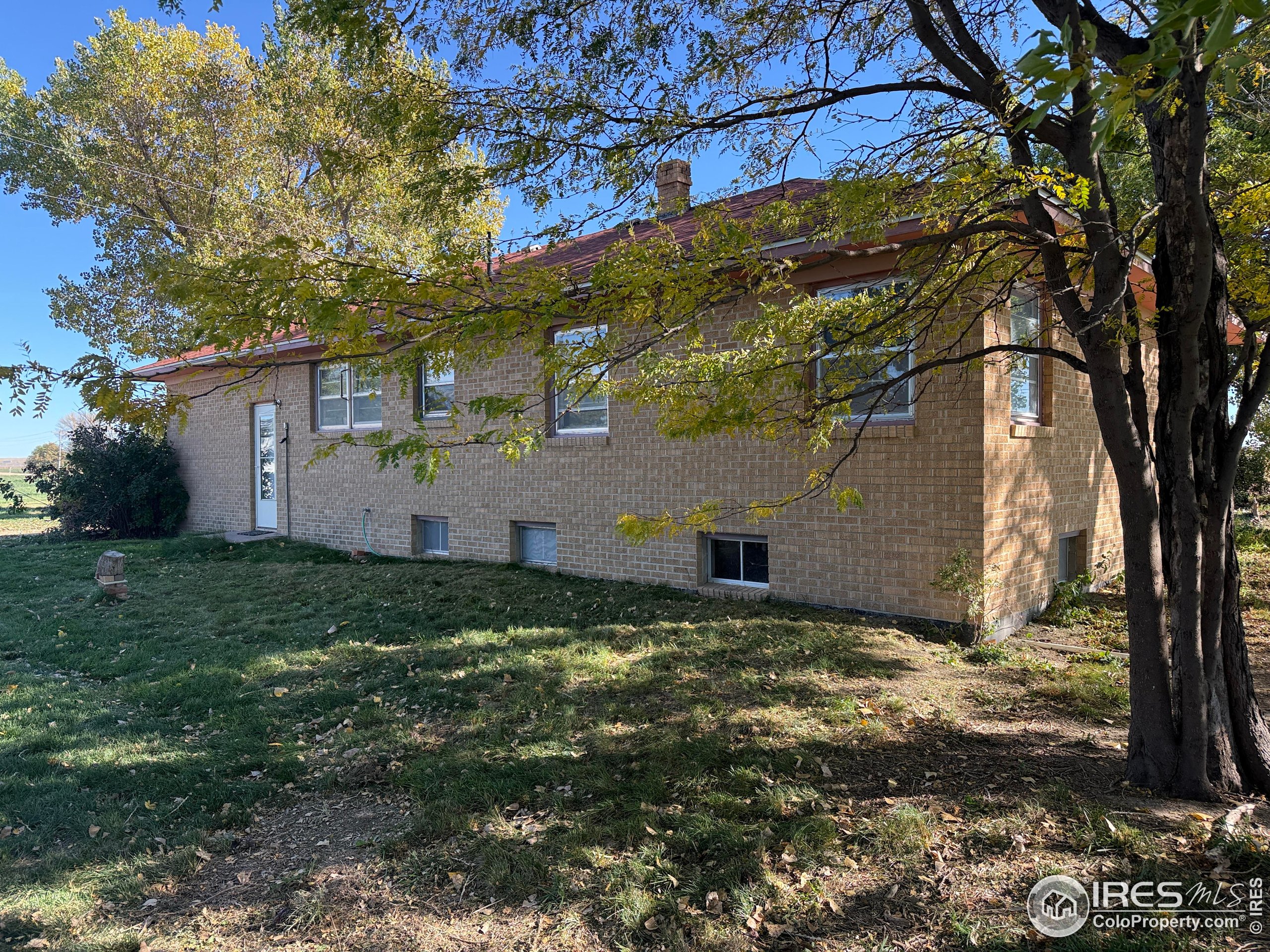 31123 County Road West Brush, CO 80723 - Photo 2 of 11 a view of a house with a yard