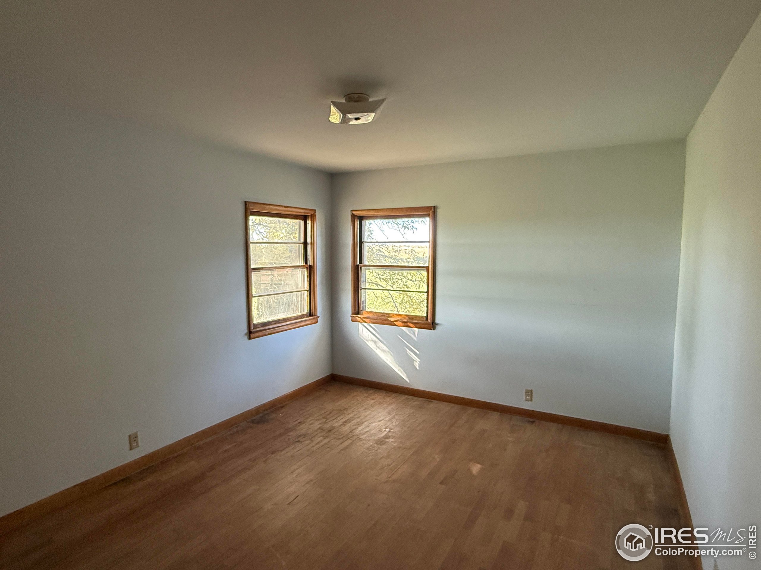 31123 County Road West Brush, CO 80723 - Photo 8 of 11 an empty room with windows
