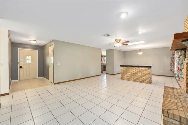 a view of an empty room and window