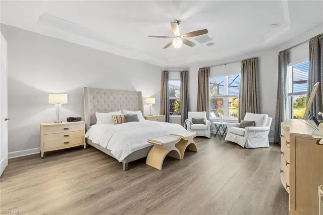 a bed room with two bed and a couch