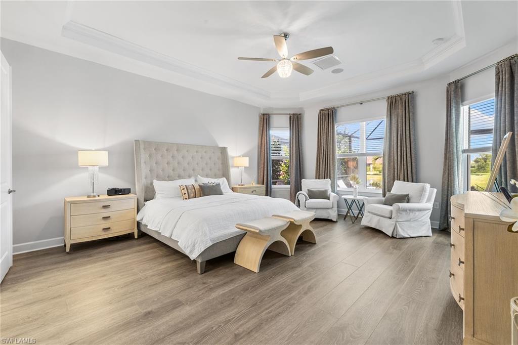 15345 Aprile Street Naples, FL 34114 - Photo 14 of 29 a bed room with two bed and a couch