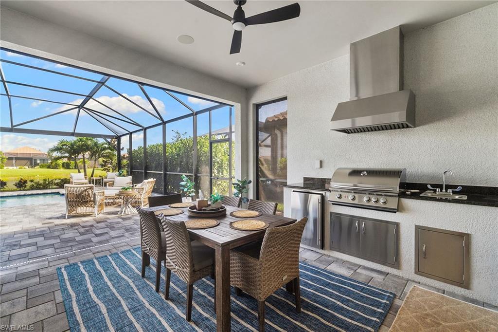 15345 Aprile Street Naples, FL 34114 - Photo 23 of 29 a view of a dining room with furniture window and outside view