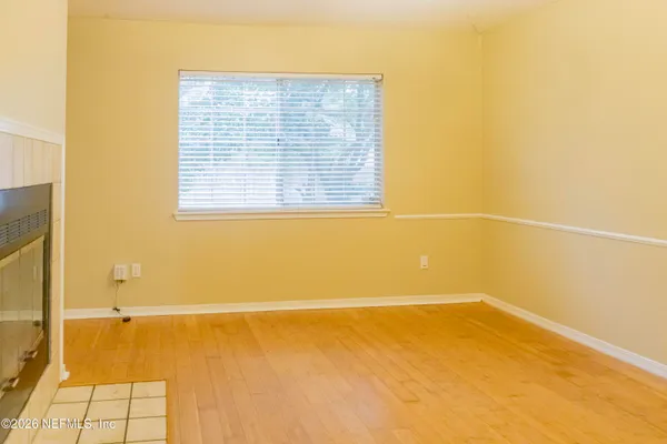 a view of a room with a large window