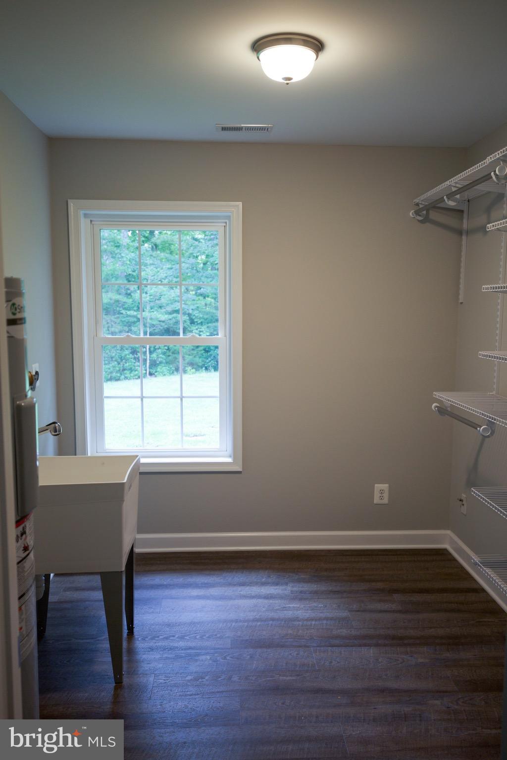 19876 Tippett Road Lexington Park, MD 20653 - Photo 21 of 24 Large laundry/utility room w/ storage