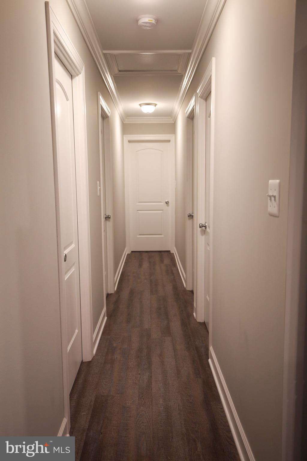 19876 Tippett Road Lexington Park, MD 20653 - Photo 10 of 24 Hallway leads to 4 bedrooms and bathroom