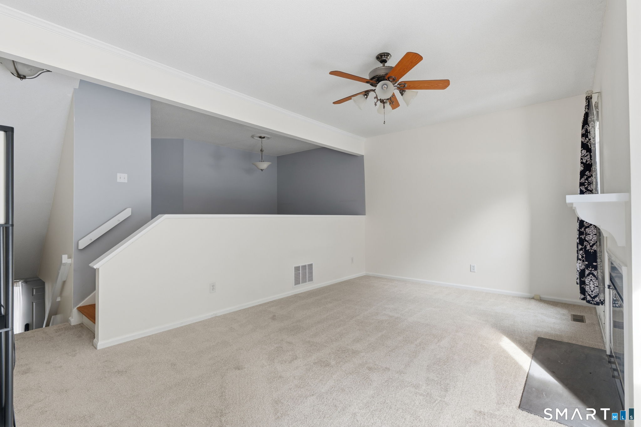 73 Metacomet Drive, Unit 73 Meriden, CT 06450 - Photo 6 of 37 a workspace with a ceiling fan