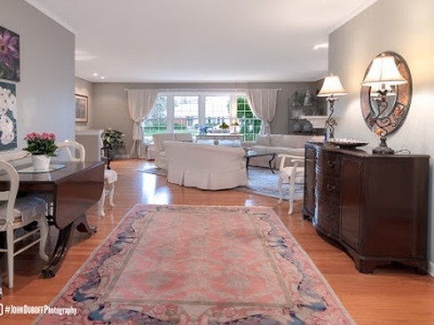 1850 Burton Lane Park Ridge, IL 60068 - Photo 14 of 34 a living room with a large window a table and chairs