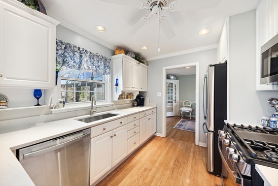 1850 Burton Lane Park Ridge, IL 60068 - Photo 16 of 34 a large kitchen with a lot of counter space and a sink