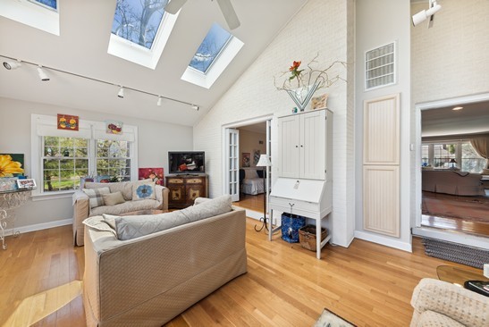 1850 Burton Lane Park Ridge, IL 60068 - Photo 19 of 34 a living room with furniture and a fireplace