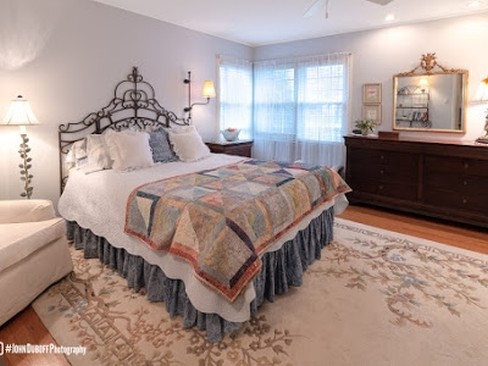 1850 Burton Lane Park Ridge, IL 60068 - Photo 20 of 34 a bedroom with a bed and a dresser