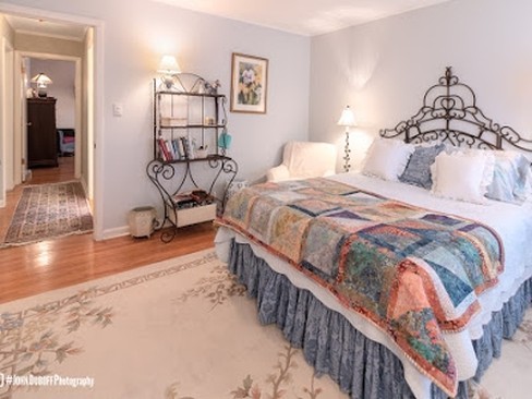 1850 Burton Lane Park Ridge, IL 60068 - Photo 21 of 34 a bedroom with double bed and a window