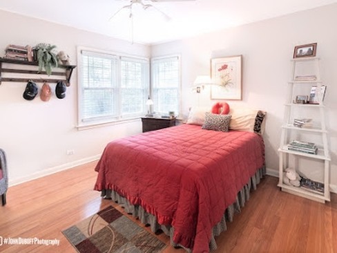 1850 Burton Lane Park Ridge, IL 60068 - Photo 23 of 34 a bedroom with a bed and a window